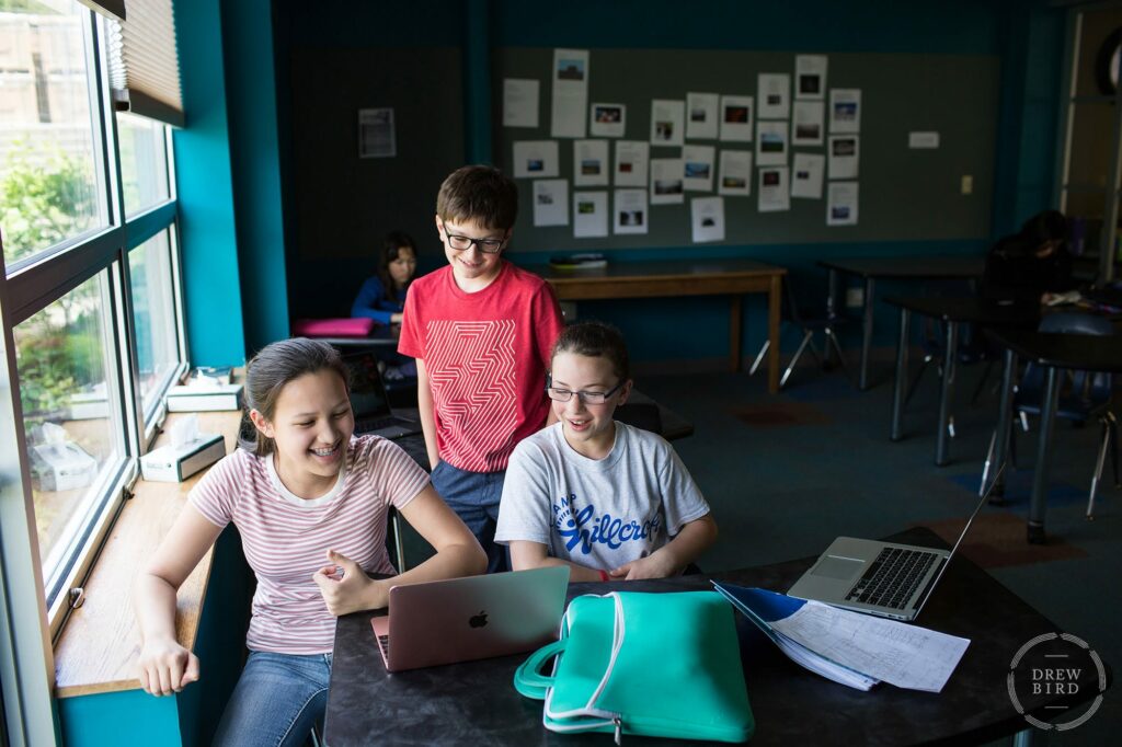 Students working together on a project in the classroom at Poughkeepsie Day School. San Francisco education marketing photographer Drew Bird. San Jose school branding photographer.