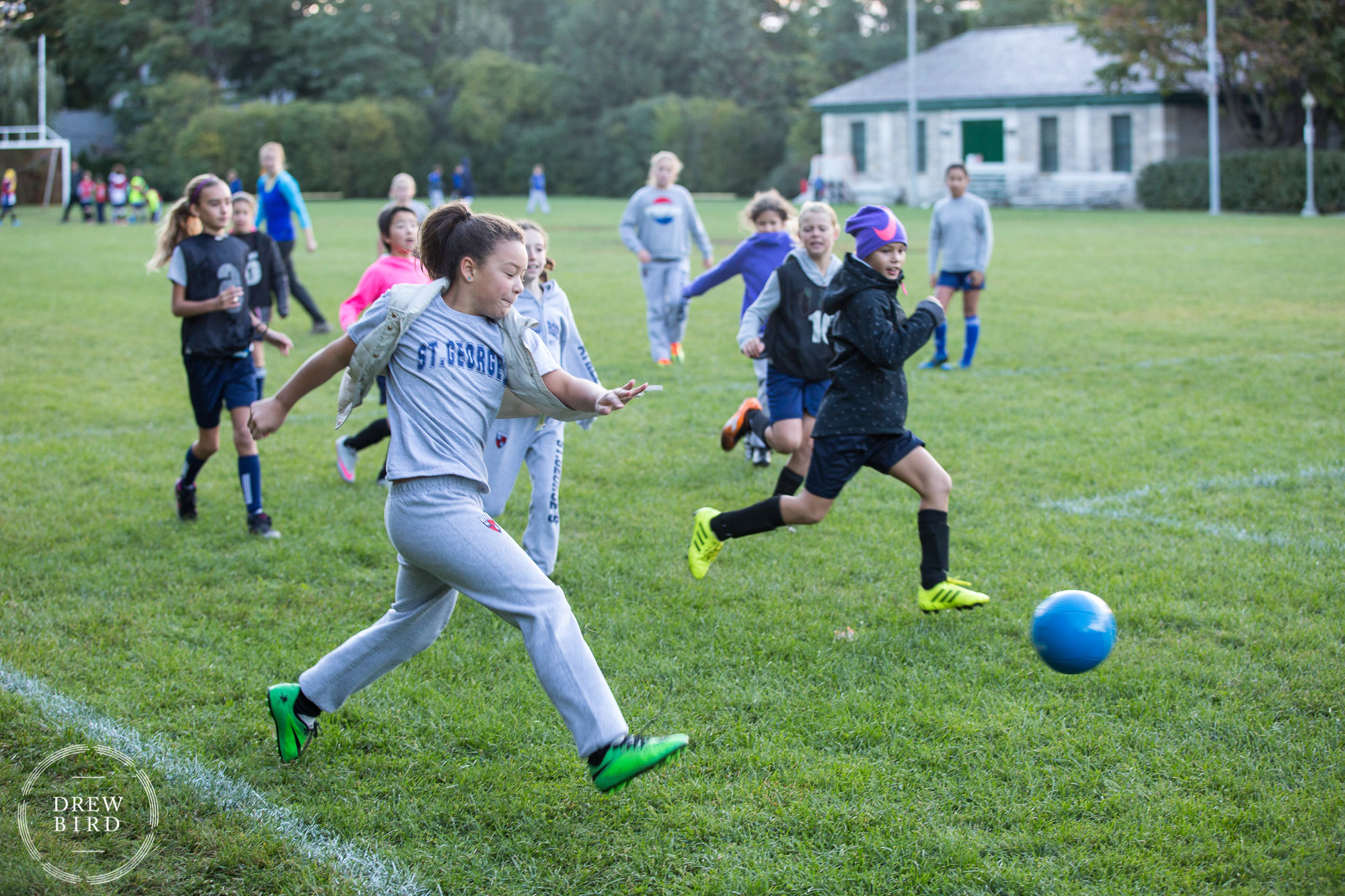 Girls soccer practice in the early morning before school at St. George's School of Montreal in Quebec, Canada. San Francisco independent school photographer and private school marketing photography and brand lifestyle photography by Drew Bird.